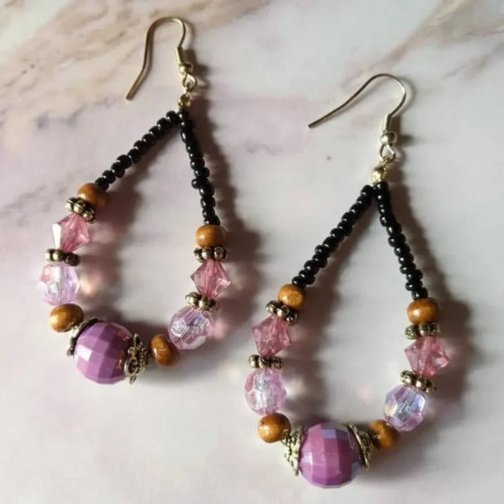 Purple and black beaded fish hook earrings